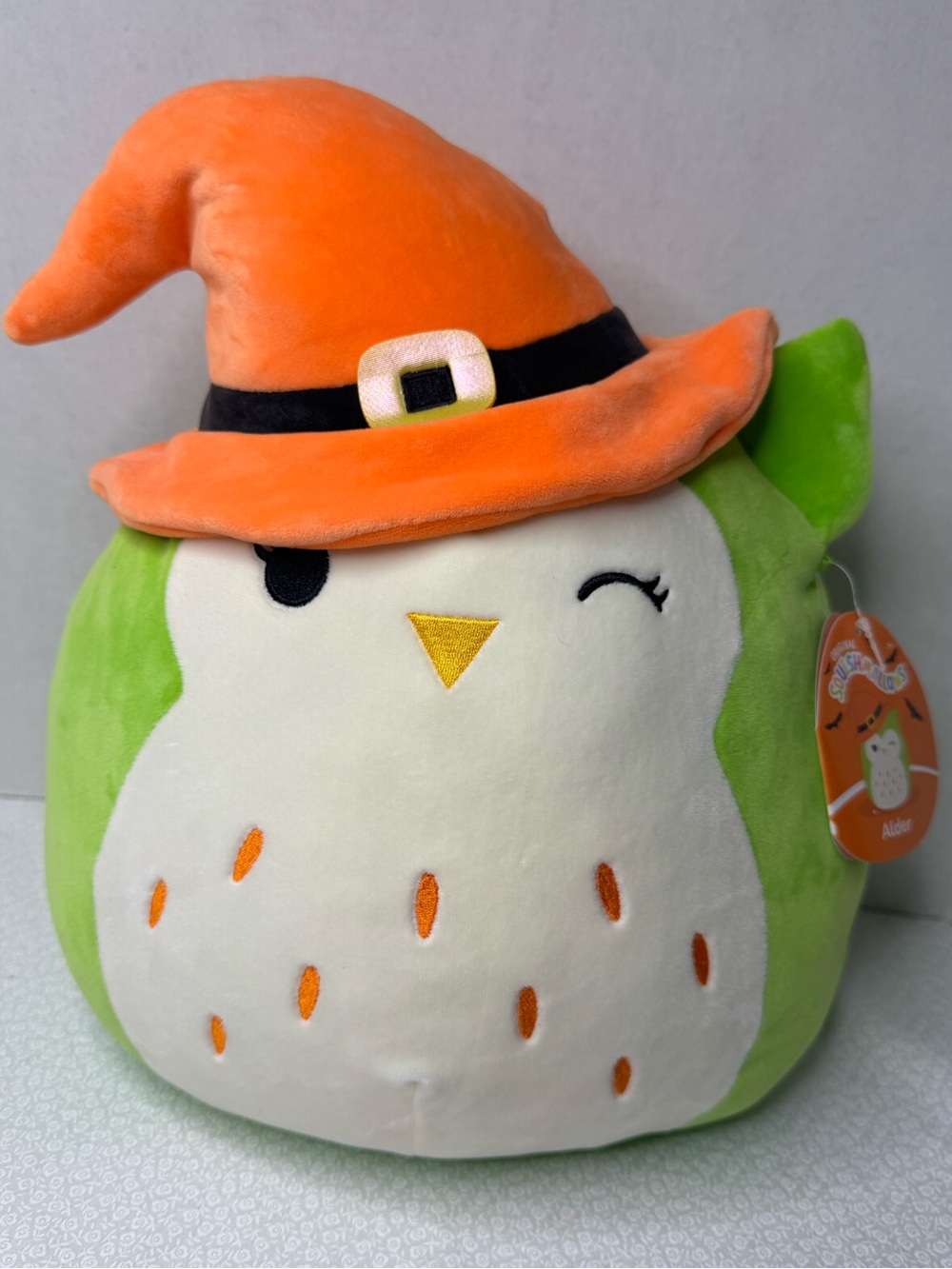 Squishmallows Alder the Owl wearing witch hat for halloween